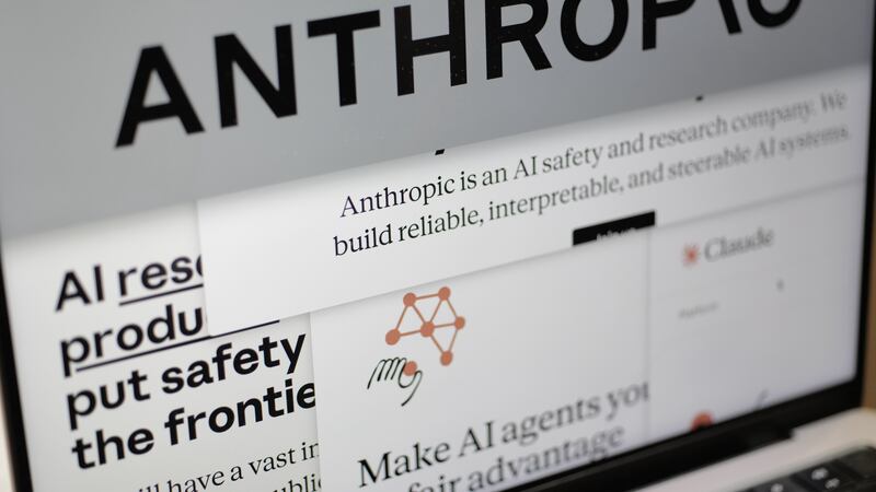 FILE - Pages from the Anthropic website and the company's logo are displayed on a computer...